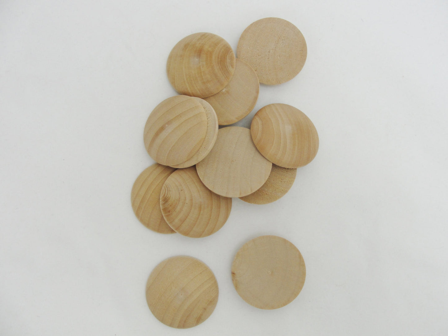 Wooden domed disc Circles 1 1/2" wide x 5/16" thick set of 12 - Wood parts - Craft Supply House