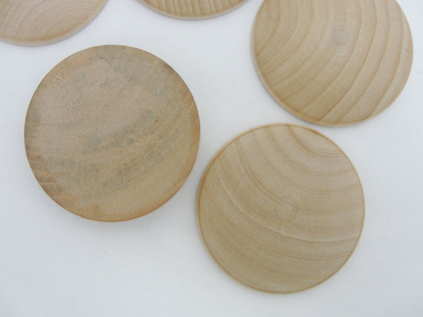 Domed wood disc 2" wide x 5/16" thick set of 12 - Wood parts - Craft Supply House