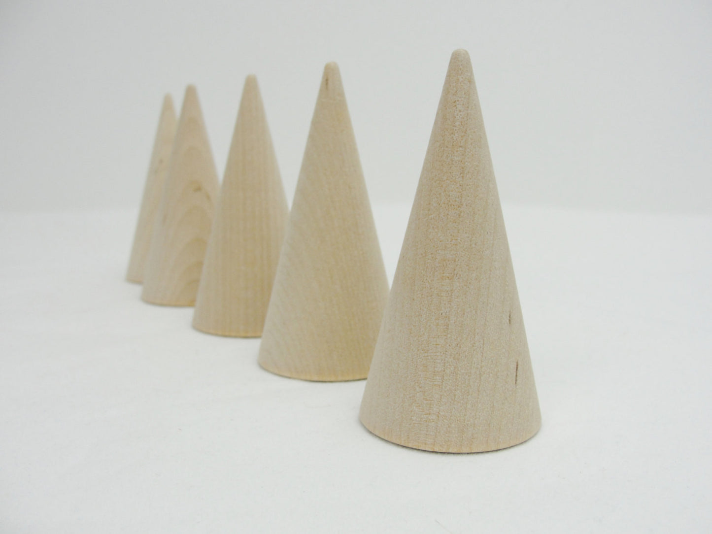 3" tall wooden cones, ring cones set of 5 - Wood parts - Craft Supply House