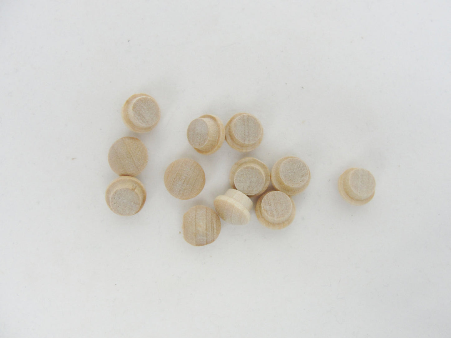 Tiny mushroom button plug 1/4" set of 12 - Wood parts - Craft Supply House