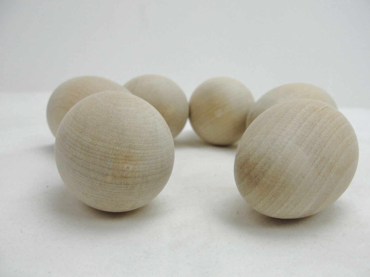 6 Wooden hen eggs rounded on both ends, lifesize hen egg