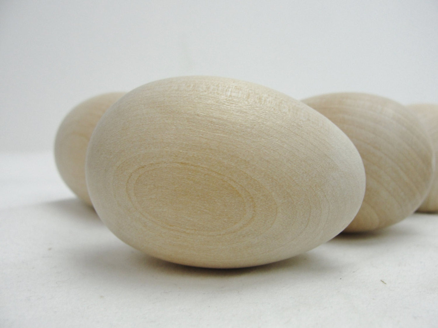 6 Wooden hen eggs rounded on both ends, lifesize hen egg