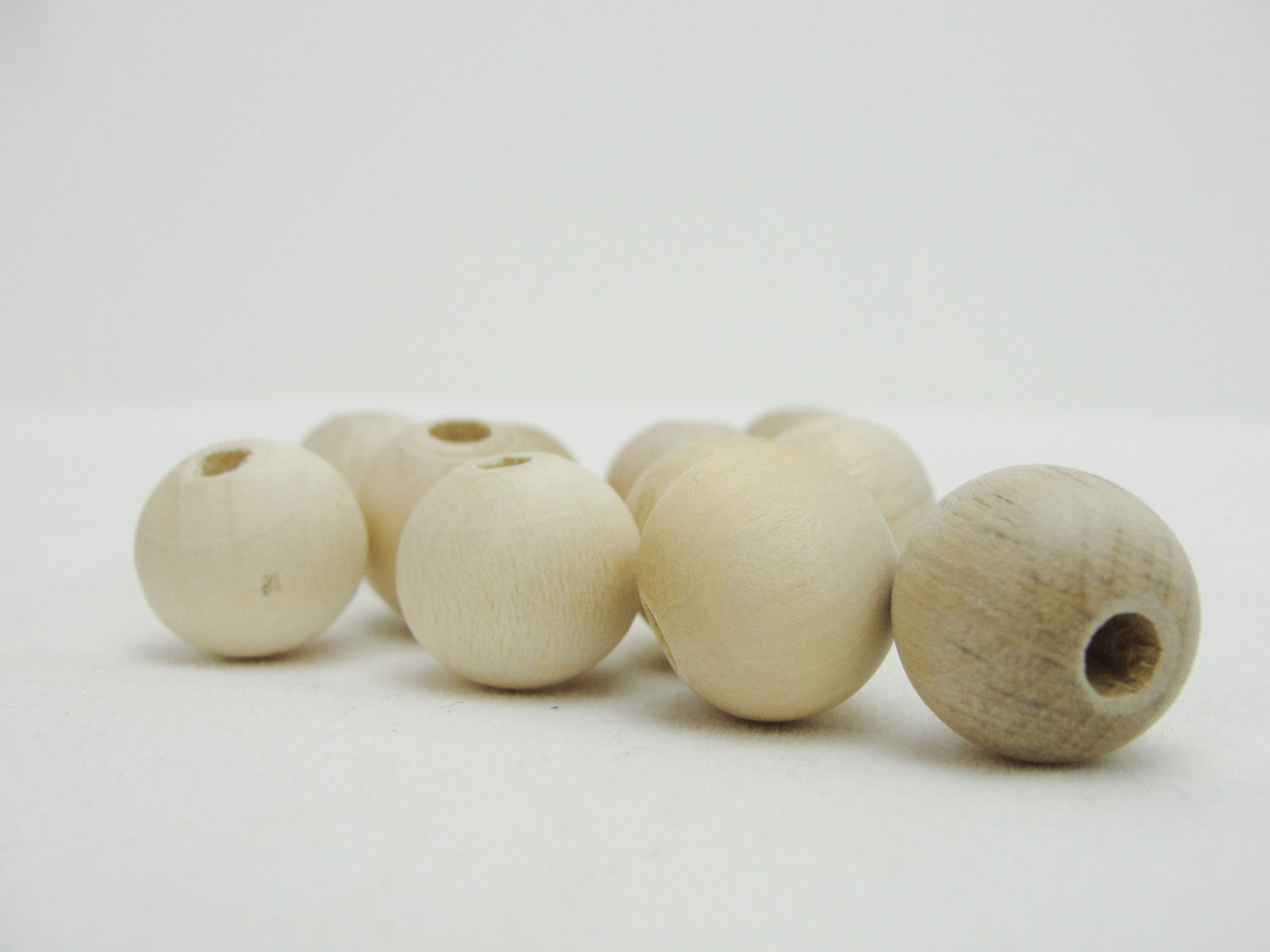 16mm unfinished round wooden beads, 5/8" (.62") with 5/32" hole - Wood parts - Craft Supply House