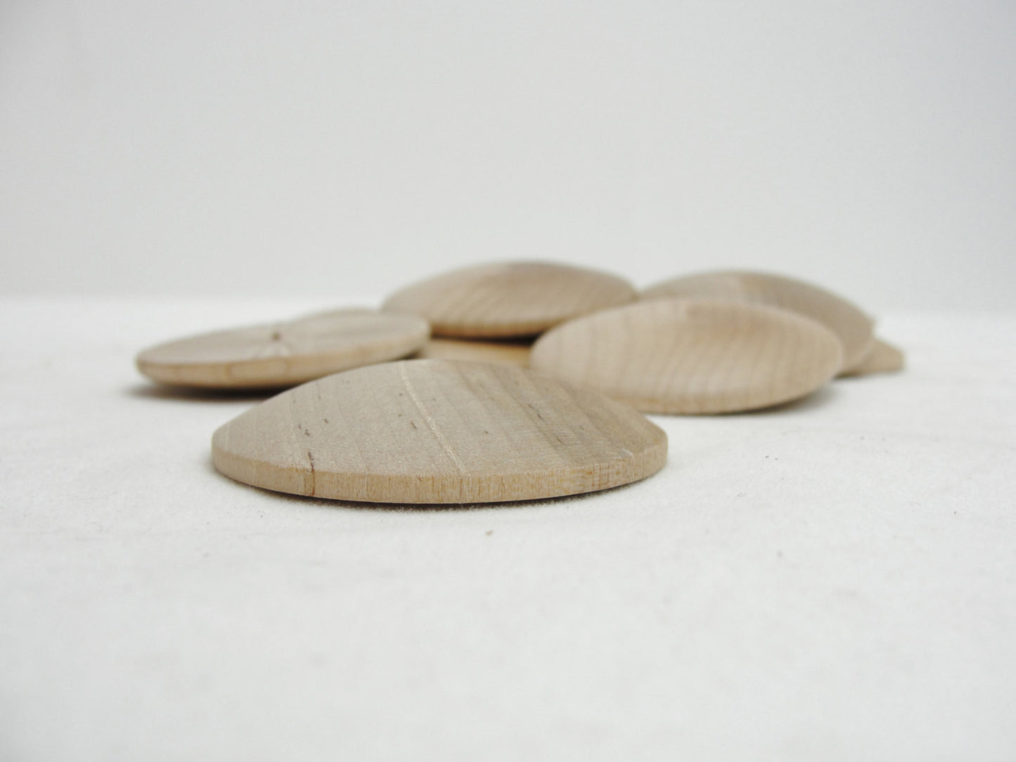Wooden domed disc 1 3/4" wide x 5/16" thick set of 12 - Wood parts - Craft Supply House