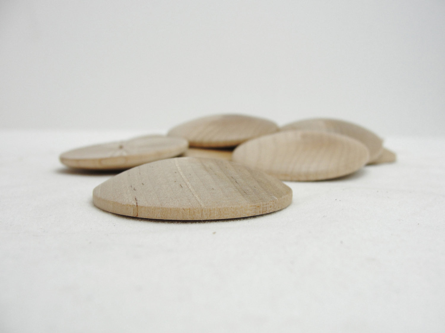 Wooden domed disc 1 3/4" wide x 5/16" thick set of 12 - Wood parts - Craft Supply House