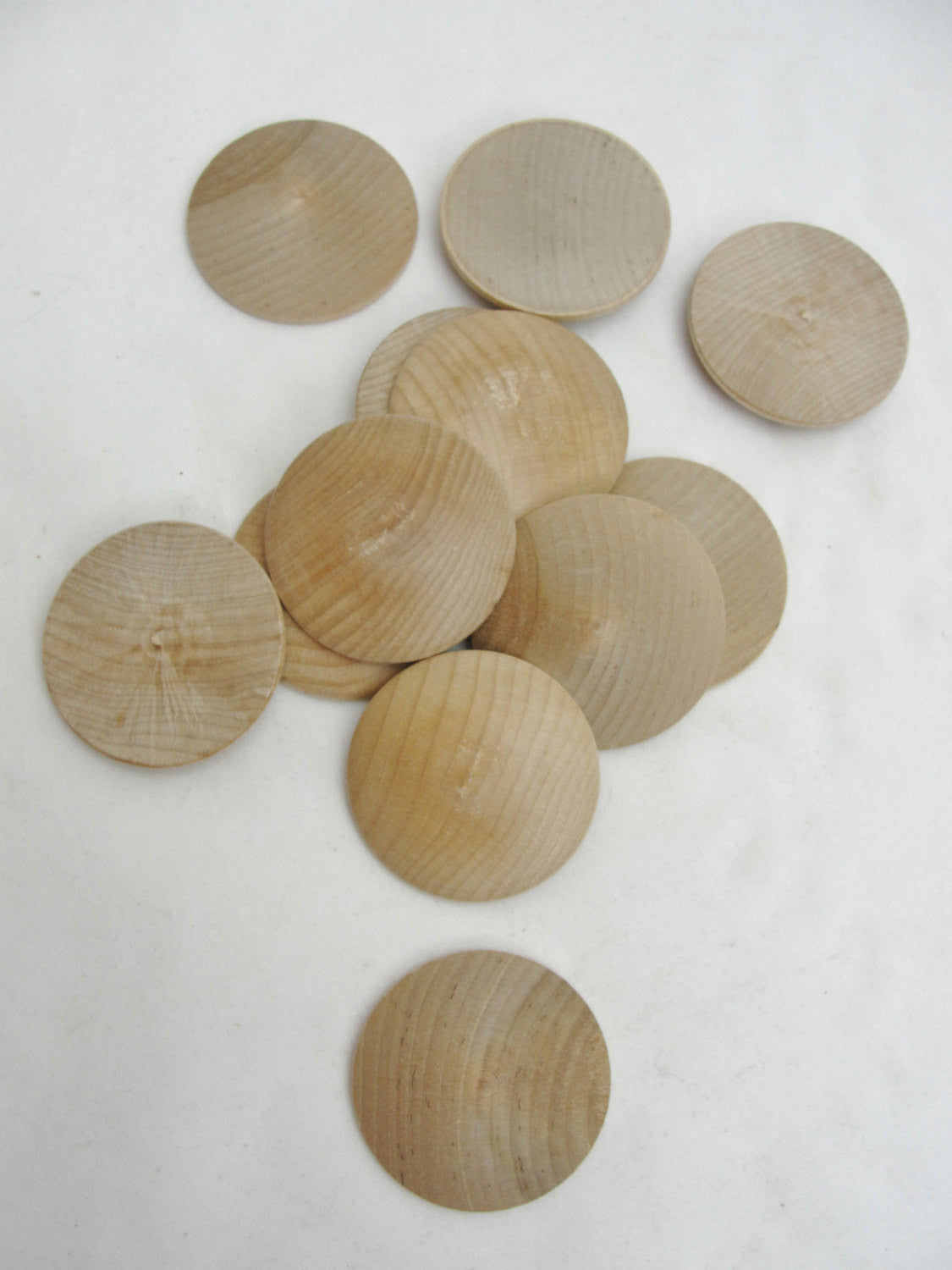 Wooden domed disc 1 3/4" wide x 5/16" thick set of 12 - Wood parts - Craft Supply House