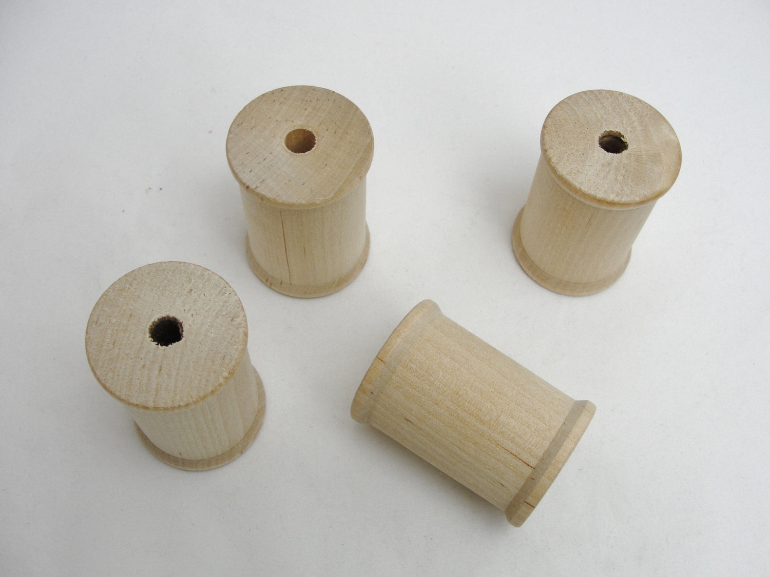 Wooden spool 2" tall set of 4 - Wood parts - Craft Supply House